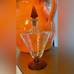 Art Deco Decanter Stylized Flower
Etched Faceted amber Accents
Footed 10"